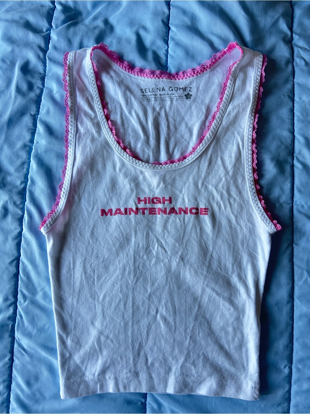 Selena Gomez “High Maintenance” White Tank Top with Pink Trim